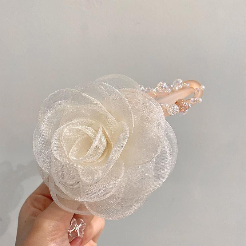 Elegant hårklips med blomster